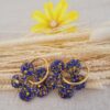 Modèle bijoux tendance forme fleur bleu et jaune